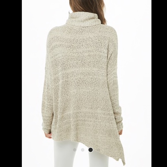 Asymmetrical turtle neck sweater